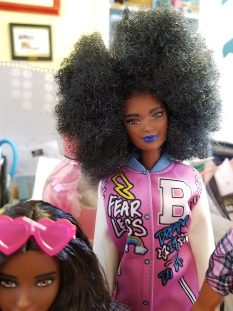 Barbie Fashionista 156 with blue lipstick and an afro