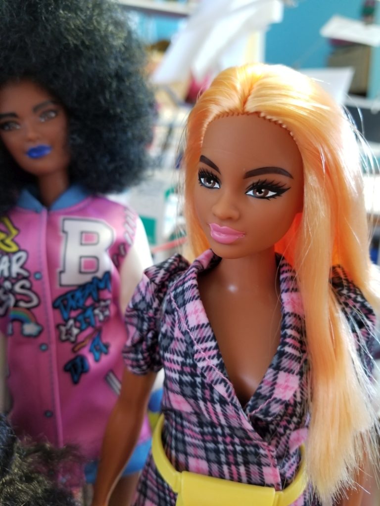 Barbie Fashionista 161 with orange hair and a plaid outfit